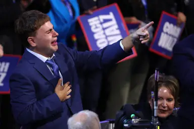 2024-08-22T043509Z_1041632538_HP1EK8M0CQIJI_RTRMADP_3_USA-ELECTION-DEMOCRATS-1-1024x683.png